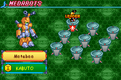 The team screen before a battle, with Metabee and the KABUTO medal, and a LEADER marker